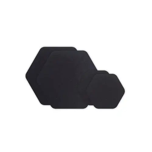 Three black Gear Aid Tenacious Tape Hex Patches of different sizes are stacked together on a white background, highlighting the durability and long-lasting performance Gear Aid is known for.